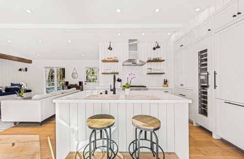 Beachwood Canyon Casa | Stunning compound w/pool house features quintessential LA indoor/outdoor living