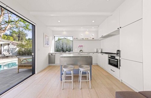 Beachwood Canyon Casa | Stunning compound w/pool house features quintessential LA indoor/outdoor living