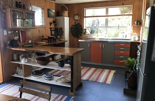 Paparoa National Park Casa | Impresionantes vistas al mar, puestas de sol en una romántica y acogedora casa de vacaciones Kiwi