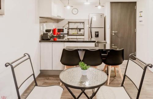 San Eugenio Apartamento | Stylish 2BR Apartment Balcony View