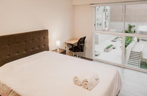 San Eugenio Apartamento | Stylish 2BR Apartment Balcony View