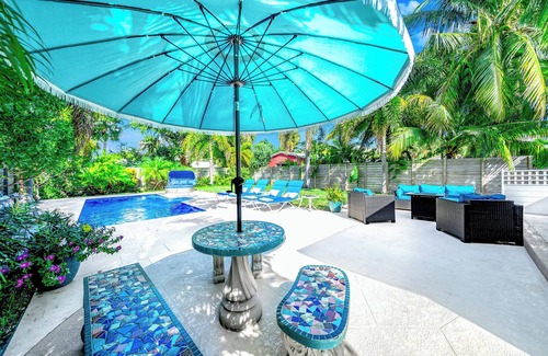Deerfield Beach Casa | Stylish Beach Home Near Boca with Pool, Golf Cart, Bikes
