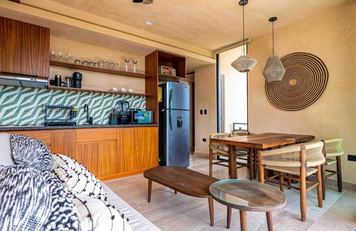 Tulsayab Condominio | Stylish condo with pool, breezy balcony & full kitchen near cenotes