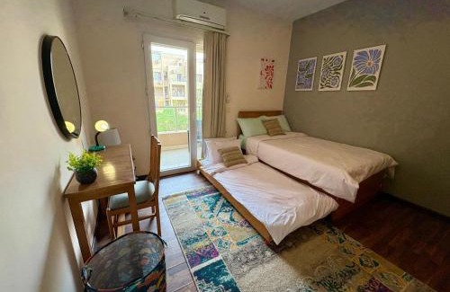Sheikh Zayed City Apartamento | Stylish Egyptian Charm 2BR in Karma Residence for families & single travelers