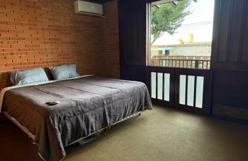 Botucatu Casa | Suíte king com ar condicionado