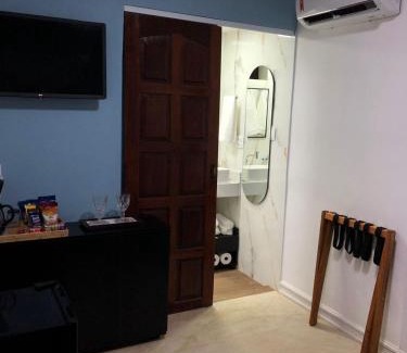 Jardim Excelsior Casa | Suíte Verão na Praia