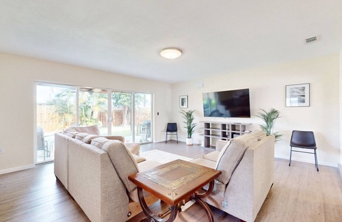 Driftwood Casa | Sunny abode in an ideal location with yard, grill, alfresco dining, open layout