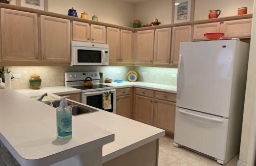 Tropical Cove Villa | Sunset Serenity Villa at Lexington CC Lake Village