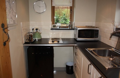 Clifton Hampden Casa | Granero con tejado de paja con vistas al río Támesis