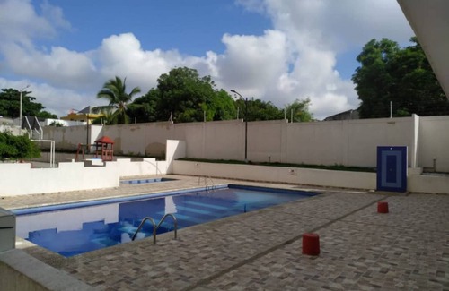 Soledad Apartamento | The apartment has a balcony overlooking the city.