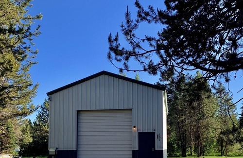Wagon Wheel Casa | The Barndominium 167 with a Hot Tub on a 1/2 acre