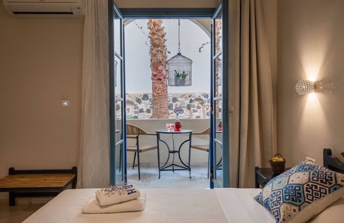 Kamari Hotel | The Boathouse Hotel