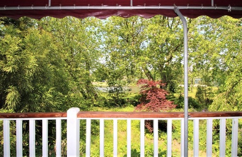 Village Green Casa | The Duck Pond Cottage presented by Homestead Real Estate!