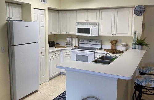 Naples Condominio | El enclave de Nápoles