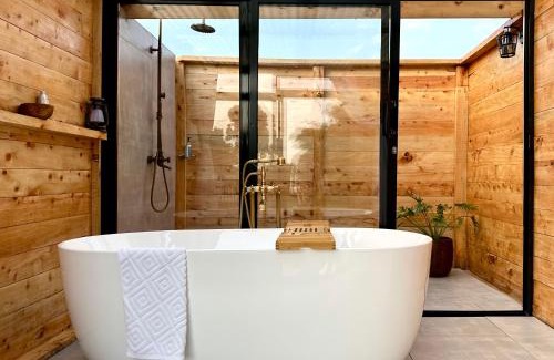 Riara Ridge Casa | The Farmhouse, Tigoni, 1920s home, 85 acre tea farm, outdoor bath & shower