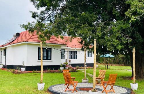 Riara Ridge Casa | The Farmhouse, Tigoni, 1920s home, 85 acre tea farm, outdoor bath & shower