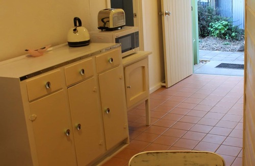 Kingscote Cabaña | La cabaña del herrero histórico de la fragua