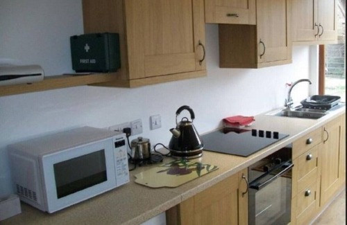 Llanfihangel Tal-y-llyn Casa | El granero - Conversión de granero de autoservicio