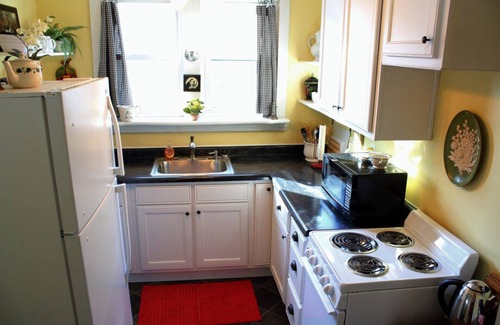 Owensboro Casa | The Green Garden Cottage es una casa de +1200 pies cuadrados, ubicada en el centro