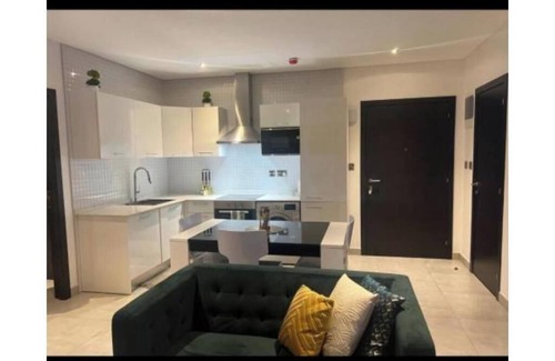 East Legon Apartamento | The Signature Hotel queen studio with balcony #8