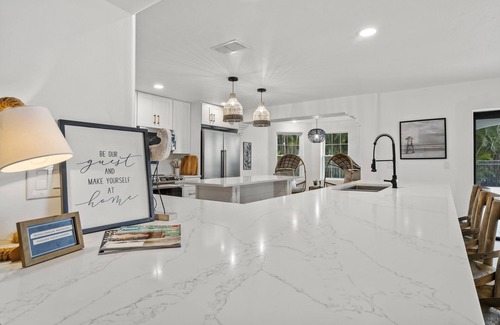 Biggar Casa | The Sunset Escape: Riverfront Elegance with Pool