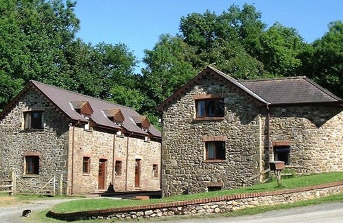 Whitland Cabaña | La Torre - Rodeada por más de 450 acres de tierra de cultivo orgánico