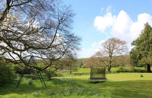 Whitland Cabaña | La Torre - Rodeada por más de 450 acres de tierra de cultivo orgánico