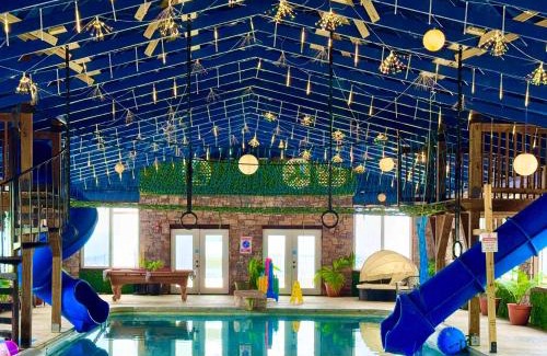 Bryant Apartamento | The Yurt at Paradise Pointe with a hot tub fire pit & Grill