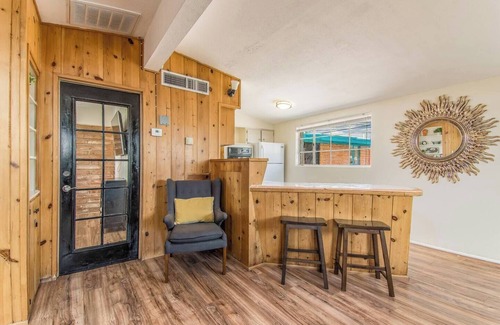 The Garden District Apartamento | This centrally located 1 bedroom features a full size pool and electric vehicle charging on site.