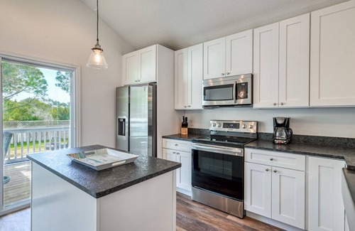 Butler Beach Casa | Tidal Paradise - Heated Pool & Firepit! Walk to the Beach!