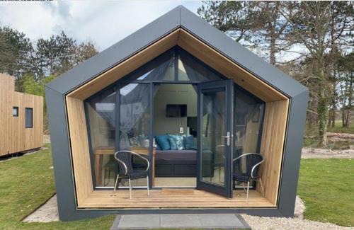 Callantsoog Casa | Tiny House in het groen, aan zee met privé Hottub