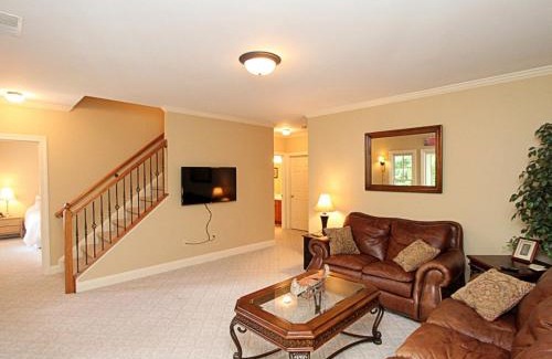 Big Canoe Casa | Tippy Canoe Lodge - Relax by the fireplace or play ping pong and foosball