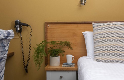 Redruth Hotel | Tolgus Family Room - 12 - A hotel room that sleeps 4 guests in 1 bedroom
