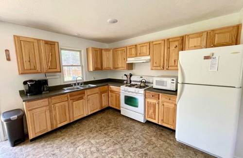 Rapid City Casa | Torch Lake Home: AC, arcades, game room, 3 min to Torch Lake! Bring your boat!