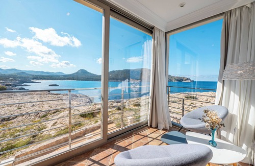 Cala Agulla Apartamento | Adosado con piscina privada en primera línea del mar