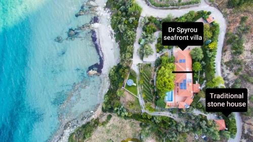 Agii Apostoli Casa | Traditional stone house by the sea.