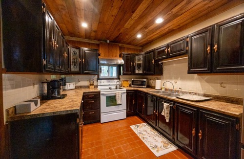 Prattsburgh Cabina | Tranquil Log Cabin Retreat on 10+ Acres w/ Pond & Fire Pit!