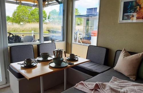 Havelsee Casa | Traumhaus-auf-dem-Wasser-Modernisiertes-Hausboot-13-x-4-m