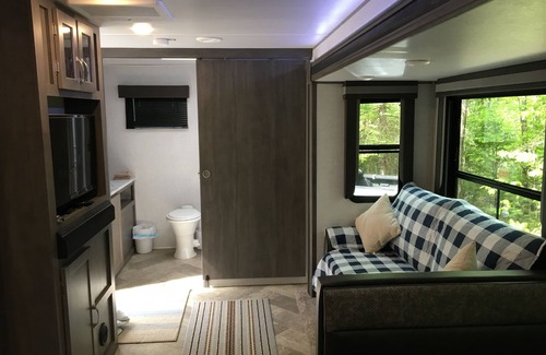 Norway Casa | Travel Trailer in the woods