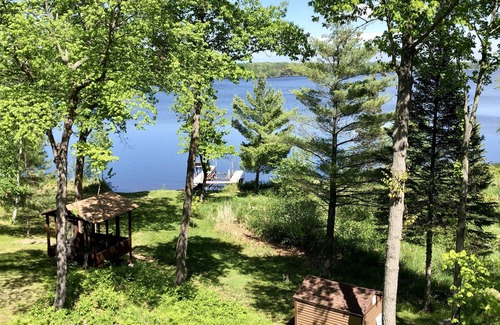 Emily Casa | Treetop Lake House on Private Wooded Acreage on the Lovely Lake Mary
