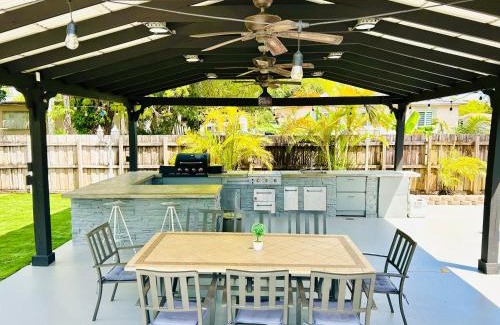 Liberty City Casa | Tropical Paradise 3BR Oasis with Heated Pool and Summer Kitchen