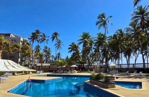 Tucacas Apartamento | Tucacas, Frente al Mar, Balcon, Piscina y Playa Privada