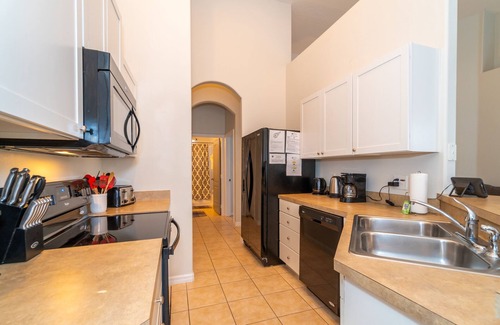 Tuscan Hills Casa | 3 dormitorios, 2 baños villa de patio con piscina. Tenis, zona de juegos, sala de juegos, gimnasio