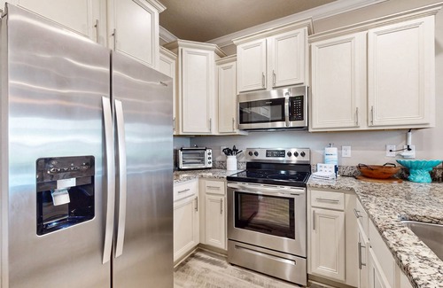 South Pensacola Casa | Two-story townhome near the beach with WiFi, washer and dryer.