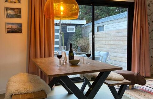 Noord Apartamento | Unieke woonark met privétuin en free parking.