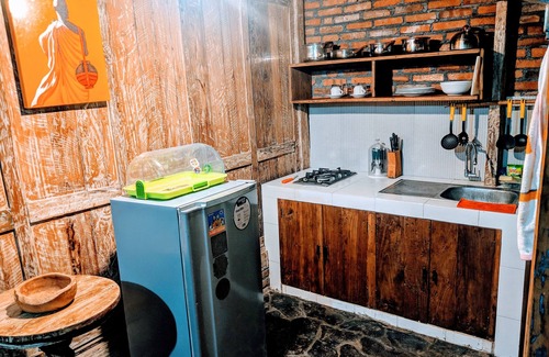 Denpasar Barat Cabaña | Única y encantadora cabaña de madera 2