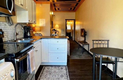 Town of Magrath Apartamento | Unique motel stay on Main St