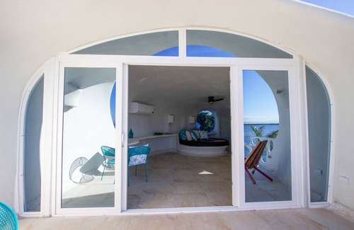 Cocoplum Apartamento | Estudio frente al mar apto para perros con servicios del resort que incluyen piscina compartida