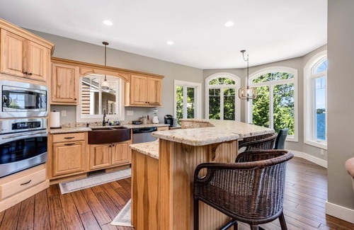 Lochmere Casa | Unwind in Waterfront Luxury: Custom Home in a Peaceful Cove