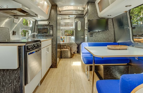 Menlo Casa | Updated Airstream tucked into trees with firepit, full bathroom & kitchenette